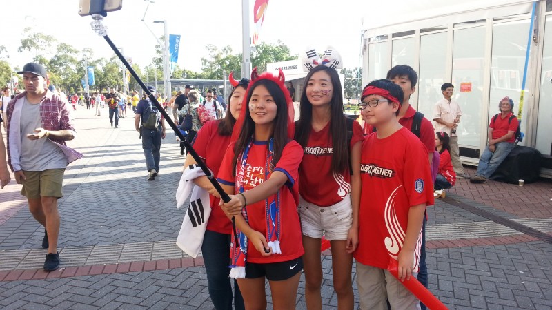 South Korea supporters taking a selfie before the match finals against Australia. Manuel Ribeiro