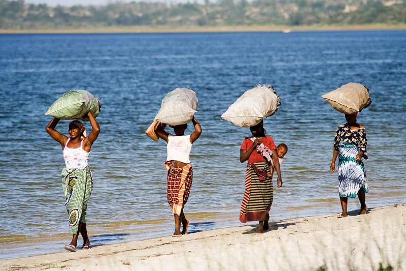 Women in Praia do Bilene, Gaza, Mozambique. Photo by Flickr user Julien Lagarde. CC BY-NC-ND 2.0