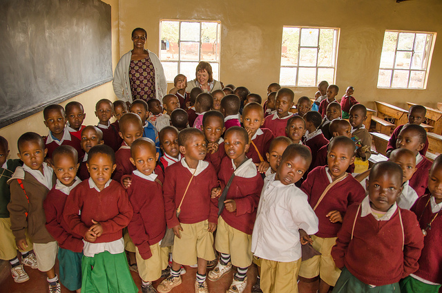School children in Arusha, Tanzania. Photo released under Creative Commons by Flickr user Colin J. McMechan. 