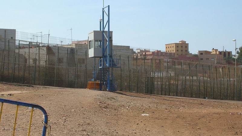 Border fence with guardpost at Spain-Morocco border by Melilla - CC-BY-2.0 via Acad Ronin 