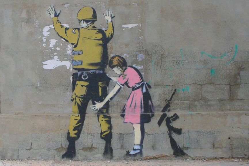 Banksy in the West Bank. Photo from www.banksy.co.uk