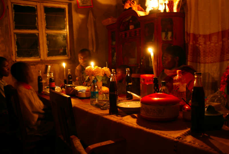 A birthday party by candlelight in Tanzania. Photo by Pernille Baerendsten, used with permission.