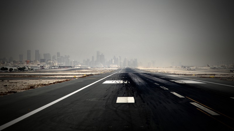 A snapshot of the runway on a flight leaving Doha airport, heading for Kathmandu, Nepal on 31 August 2010.  This is a journey many will not make alive. Image by Flickr user @elmar bajora (CC BY-NC-ND 2.0)