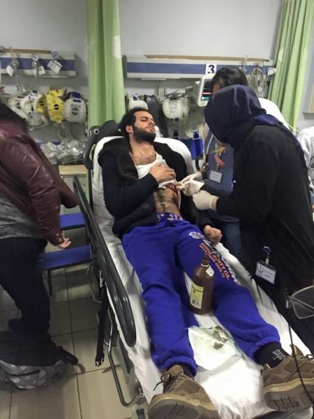 Blogger Asaad Hanna receiving treatment at an Istanbul hospital after being stabbed in his home earlier today. Photo credit: Asaad Hanna's Facebook page 