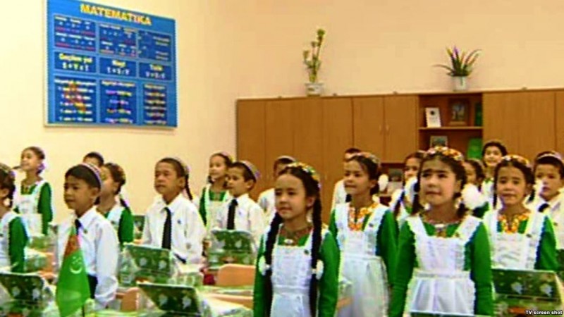 First grade Turkmen schoolgirls. All schoolgirls in Turkmenistan, like female news presenters and cabinet ministers, are obliged to wear national dress. Photo taken from Radio Free Europe's Turkmen service. Used under creative commons. 