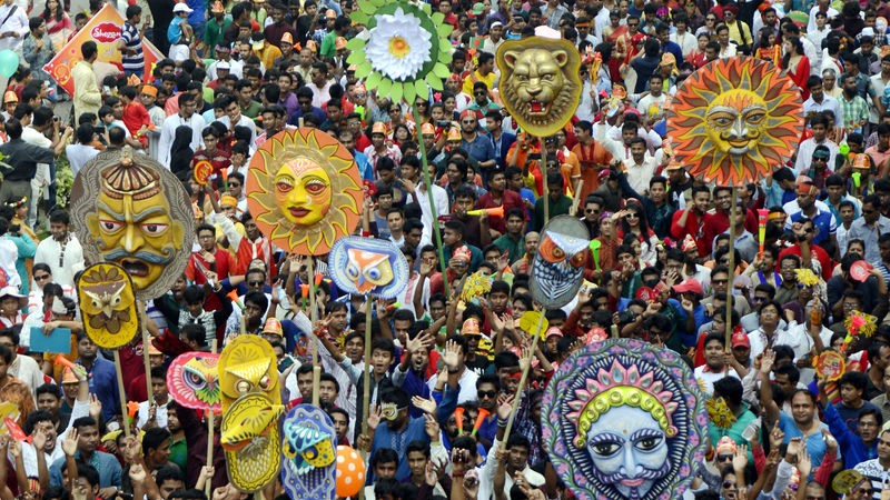 People celebrating Pahela Baishakh at Mangal Shobhajatra (Rally), a procession organised by Dhaka University’s Faculty of Fine Arts to welcome the Bengali new year. Image by  Sourav Lasker. Copyright Demotix (14/4/2015)