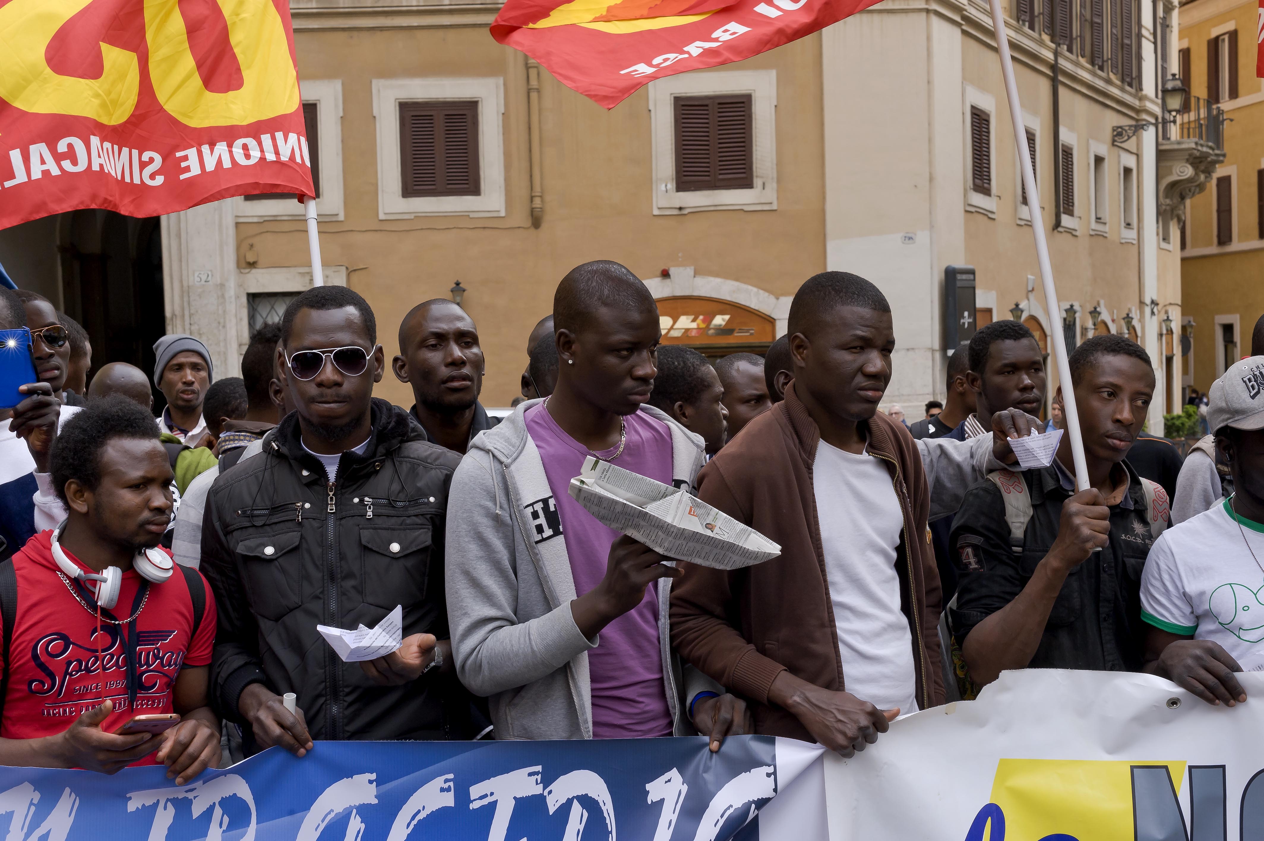 Crowds joined a rally in Rome's Piazza Montecitorio in the aftermath of a shipwreck that caused the deaths of hundreds of migrants, calling for a change in immigration policies and the right to freedom of movement in Europe. Photo by Stefano Montesi. Copyright Demotix
