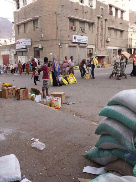 "#Yemen is deep into the humanitarian disaster. Monitors can't see the reality & won't. People are starving in #Aden,' tweets @yemen-updates, who shares this photograph of Yemenis in Aden queuing for food 