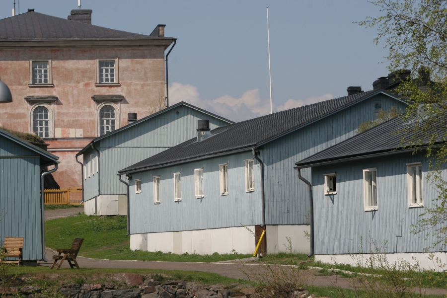 Inmates at the Suomenlinna open prison live in blue dormitory-style housing. A picket fence is all that separates the prison grounds from the rest of the island, a popular tourist destination. Credit: Courtesy of Criminal Sanctions Agency, Finland
