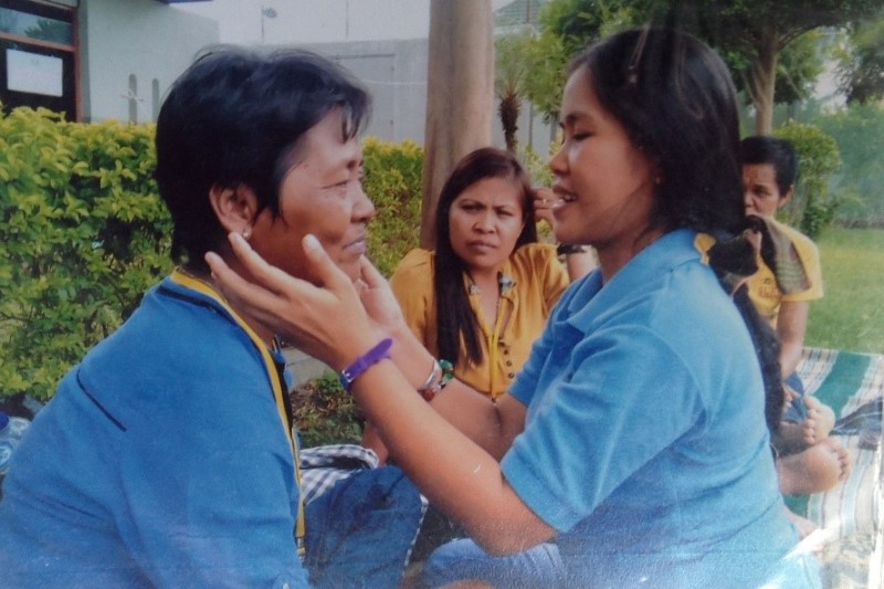 Mary Jane (right) is reunited with her mother (left) during a prison visit in 2013. Photo from Migrante