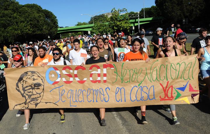 "Oscar, héros national, nous voulons que vous retourniez maintenant." Une marche pour Oscar 2013, à Puerto Rico. Photo par Ricardo Alcaraz, utilisée avec permission