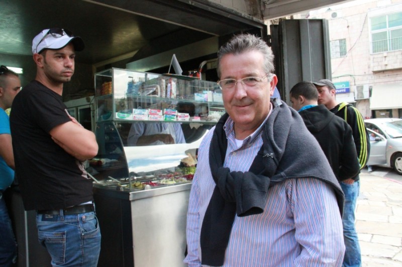 Ali Qleibo, a Palestinian anthropologist, in front of Al Waary shawarma stand in Jerusalem. Credit: Daniel Estrin. Published with PRI's permission