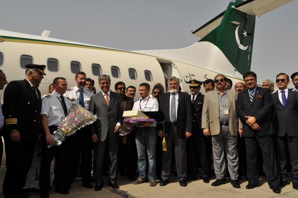 PIA's staff posing for a picture in front of a newly acquired ATR-72. A small plane that carries 72 passengers, which has been assigned to most routes in Balochistan.  Image tweeted by @Official_PIA on April 10, 2015. 