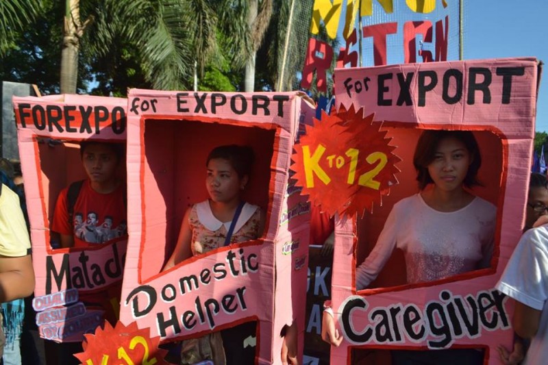 Activists decry the Philippines' labor export policy. Photo from the Facebook page of Mykel Andrada 