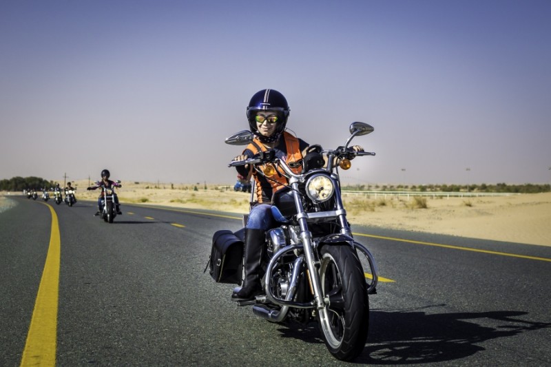 Shima Mehri leading the pack of Dubai Ladies of Harley riders on International Female Ride Day. Credit: Amanda Fisher.  Published with PRI's permission