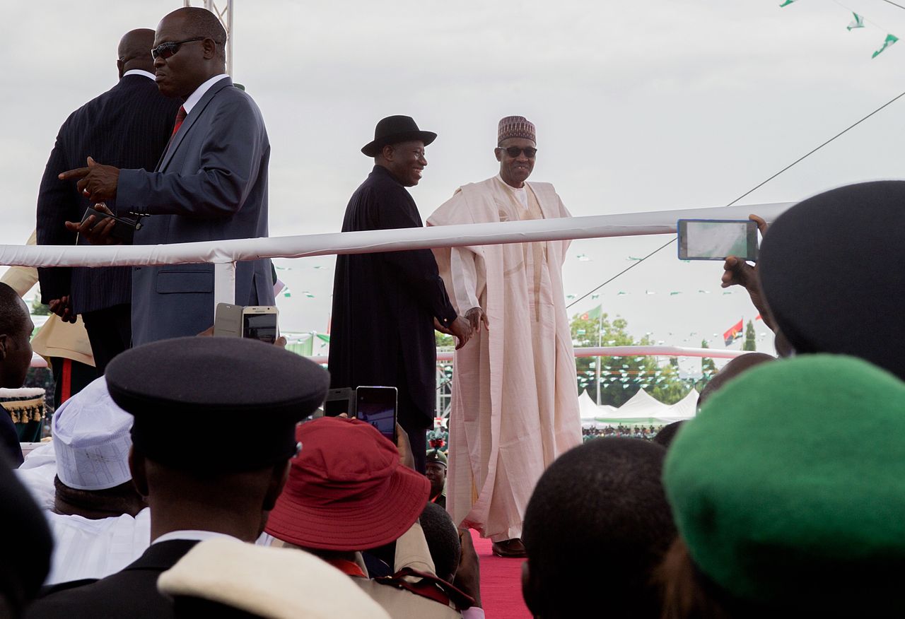 Former Nigerian President Goodluck Jonathan with newly sworn-in President Muhammadu Buhari during his inauguration ceremony on May 29, 2015. Public Domain photo from the US State Department. 