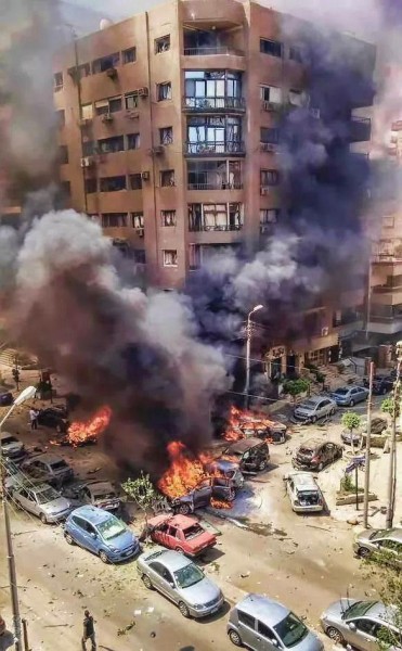 A photograph of the explosion that killed Egypt's Public Prosecutor that has gone viral on Twitter. Shared by @TheMiinz