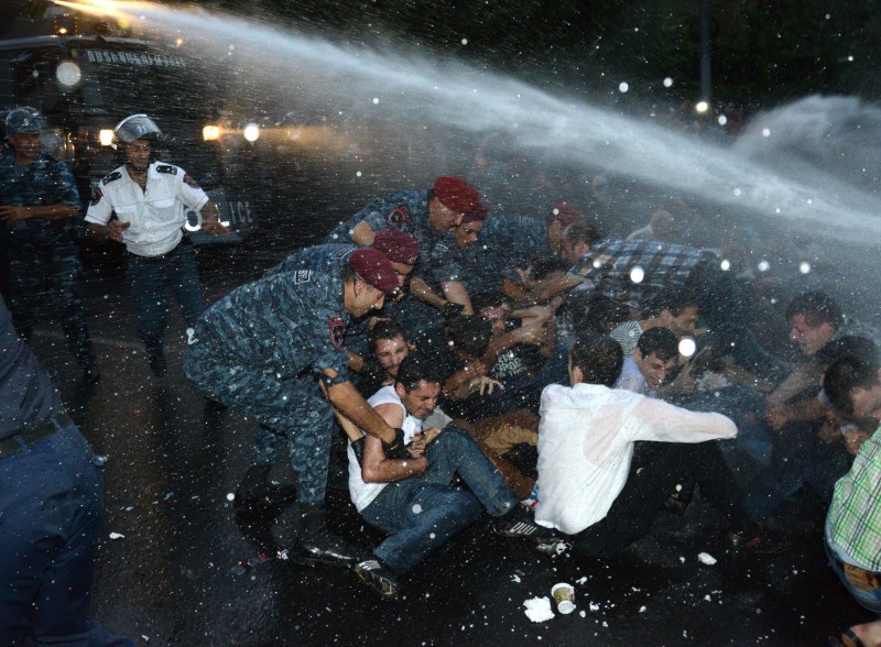 Police use water cannons to disperse demonstrations  in Yerevan on 23 June. Demotix/PHOTOLURE News Agency/7926046