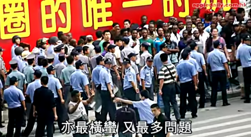 Screen capture from Apple Daily's video report on 2012 African riot in Guangzhou triggered by a suspicious death of a Nigerian during police's detention.