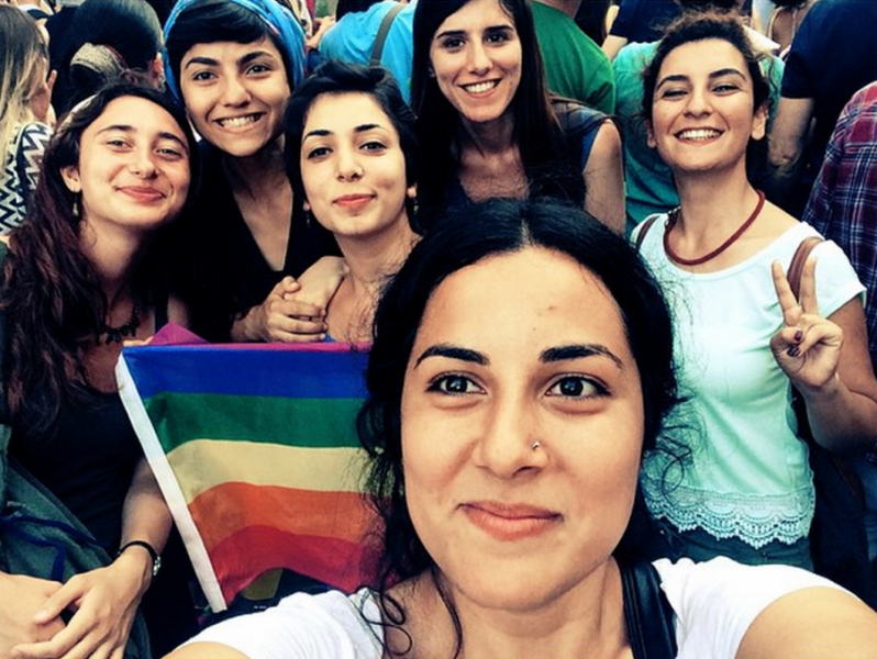 Hatice Ezgi Sadet stands at the far right of this group selfie, making a peace sign during a Gay Pride rally in Istanbul. Please note that this photo is not a photo of Suruç volunteers or victims, as the photo has widely been misrepresented on social media.  Credit: Hatice Ezgi Sadet's Instagram.