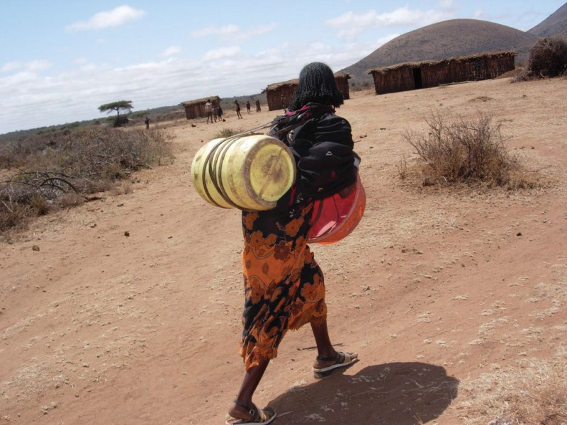 An Ethiopian woman carries a water barrel. Photo credit: 2006 Badadha Kule/IFPRI. CC BY-NC-ND 2.0