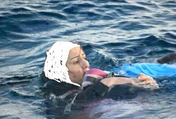 A photograph of reportedly a Syrian mother trying to swim to safety carrying her toddler child. Photo gone viral (source unknown) 