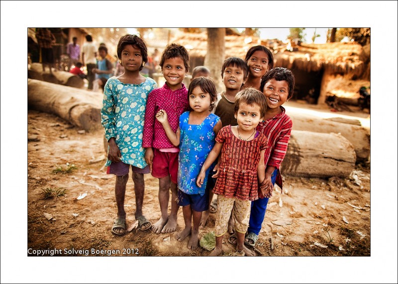 The young ones, careless and carefree, play and roam around the village. Their smiles are precious and innocent.
