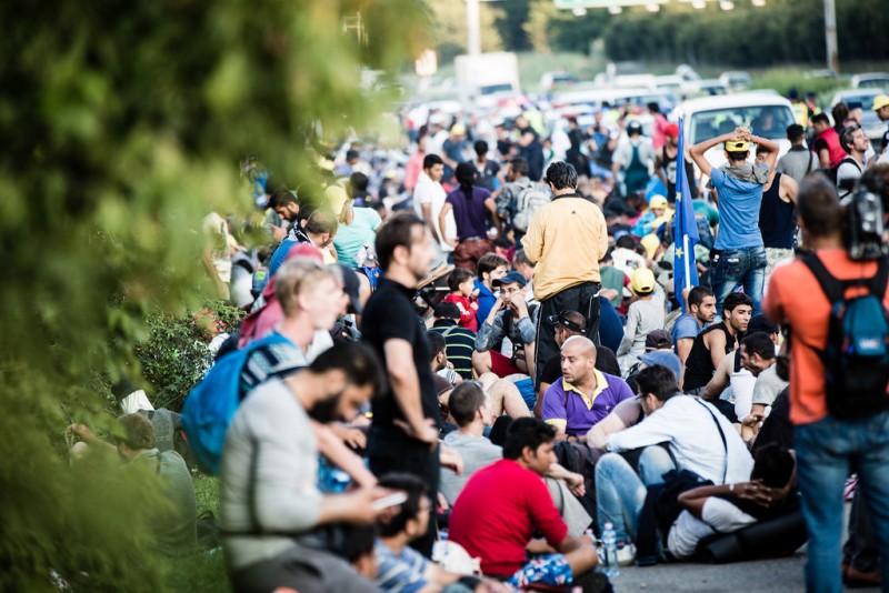 Refugees crowd a road in Budapest, Hungary. September 4, 2015. Photo by International Federation of Red Cross and Red Crescent, CC 2.0.