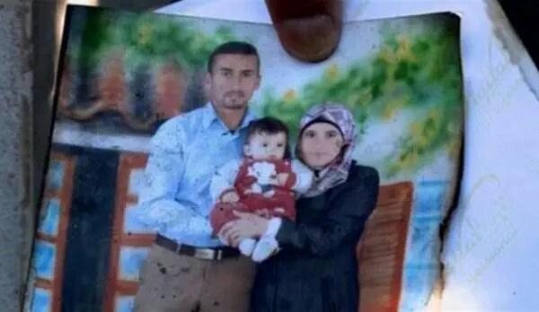 Eighteen-month-old Ali Al Dawabshen with his parents. Ali was burned to death in a settler attack on his West Bank home. His father died last week. His mother died last night. Both his parents and four-year-old brother were injured in the fire which killed him. Photograph shared by @LinahAlsaafin on Twitter 