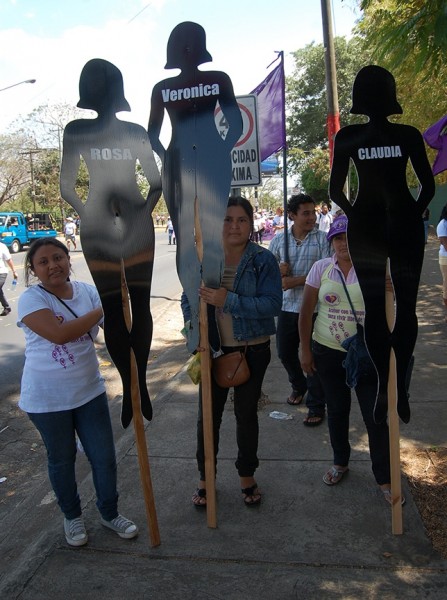 In a march for International Women’s Day in 2012, activists highlighted the growing number of femicides.  Since the passage of Law 779 in 2012, it has been rewritten so fewer murders are counted as femicides. Credit: Sara Van Note. Used with PRI's permission